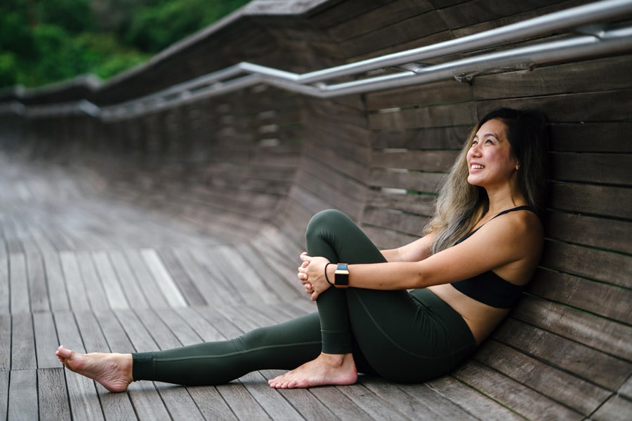 Young woman exercising to prevent weight gain and stretch marks