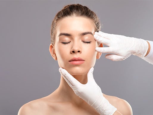 young woman getting button nose rhinoplasty